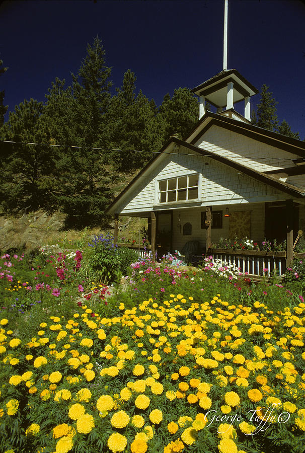 Old schoolhouse and garden. Photograph by George Tuffy