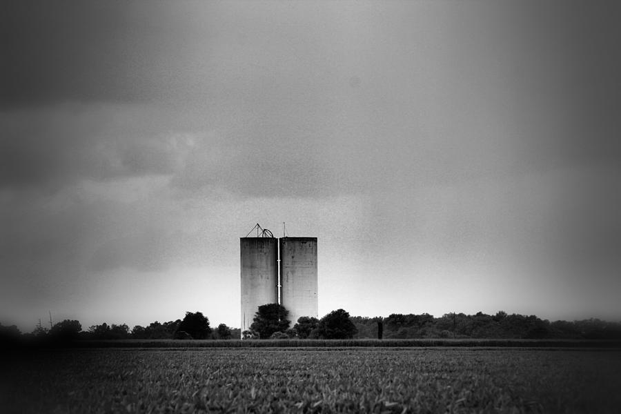 Black And White Photograph - Old Silos by Karen Wagner