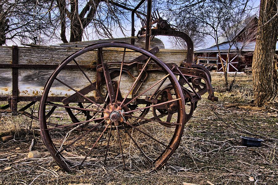 Old Spreader Wheel Photograph by Eric Rundle