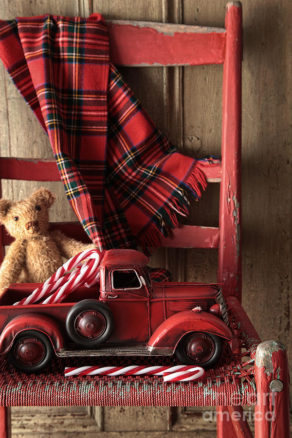 Christmas Photograph - Old toy truck with teddy bear on red chair by Sandra Cunningham
