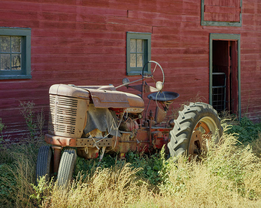 Old Tractor and Red Barn Photograph by Ann Powell