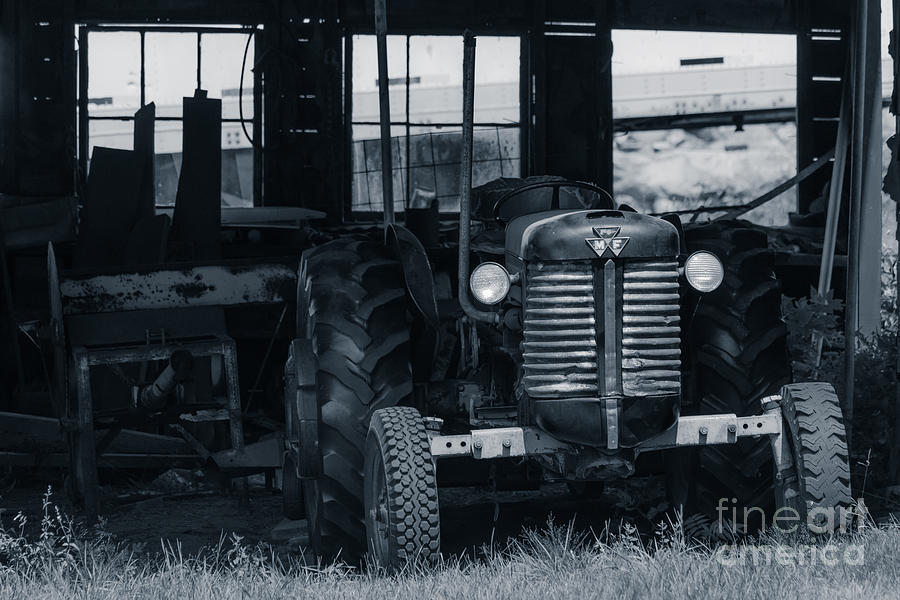 Old tractor in the barn Photograph by Edward Fielding