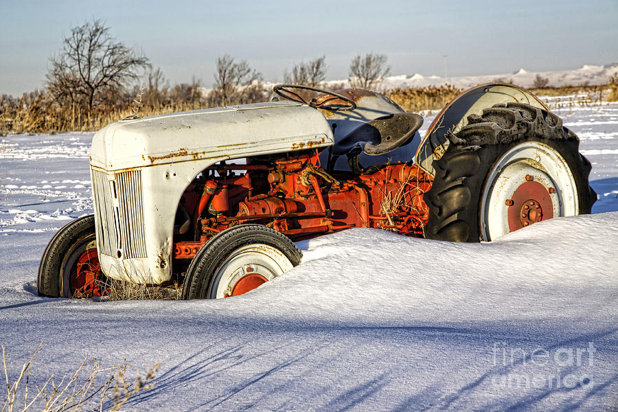 Old Tractor in the Snow Photograph by Richard Lynch