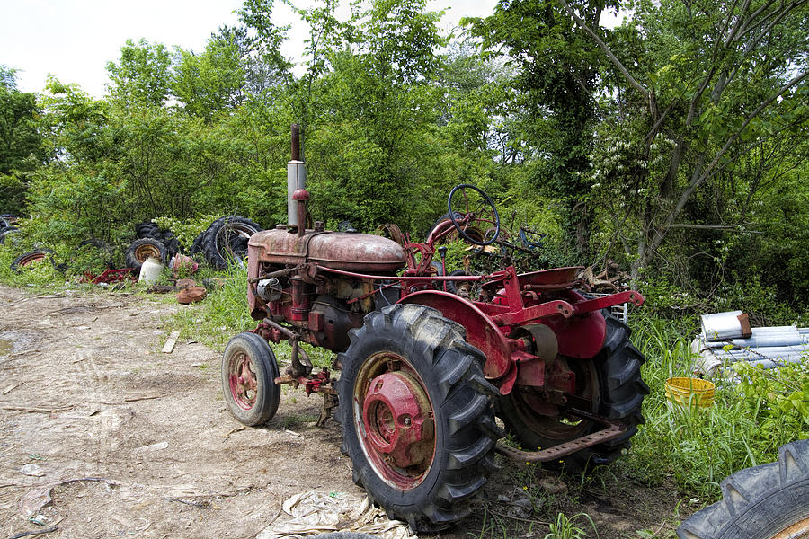 Old Tractor Treasures Photograph by Kathy Clark