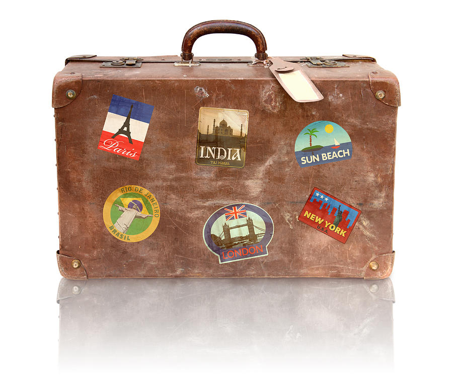 Old Used Suitcase With Travel Stickers Photograph by Narvikk