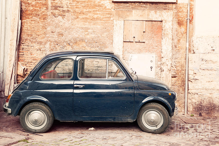 Vintage Photograph - Old vintage fiat 500 car in Rome Italy by Matteo Colombo