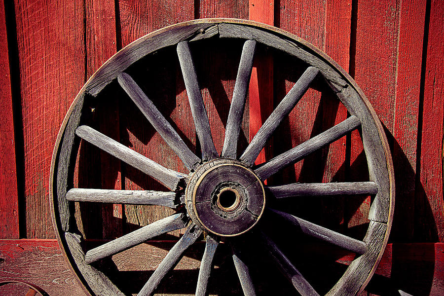 Still Life Photograph - Old Wagon Wheel by Garry Gay
