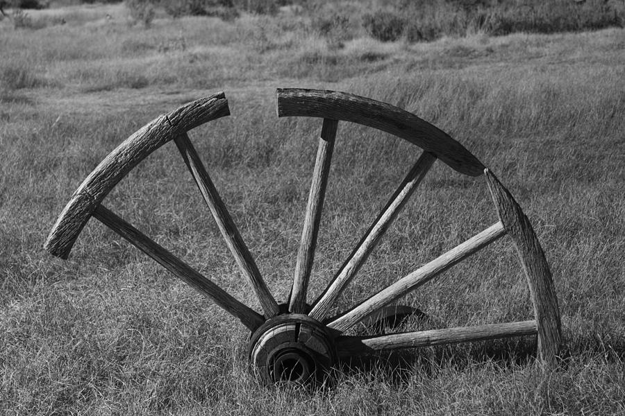 Vintage Photograph - Old vintage Wagon Wheel In Bodie by Lisza Anne McKee
