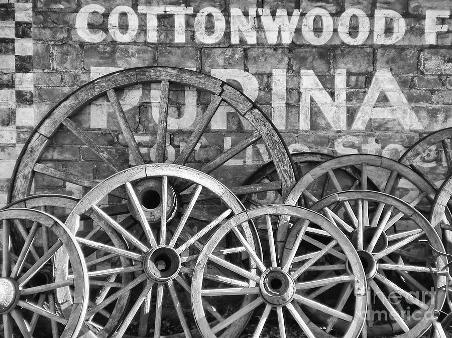 Pattern Photograph - Old wagon wheels by Paul Quinn
