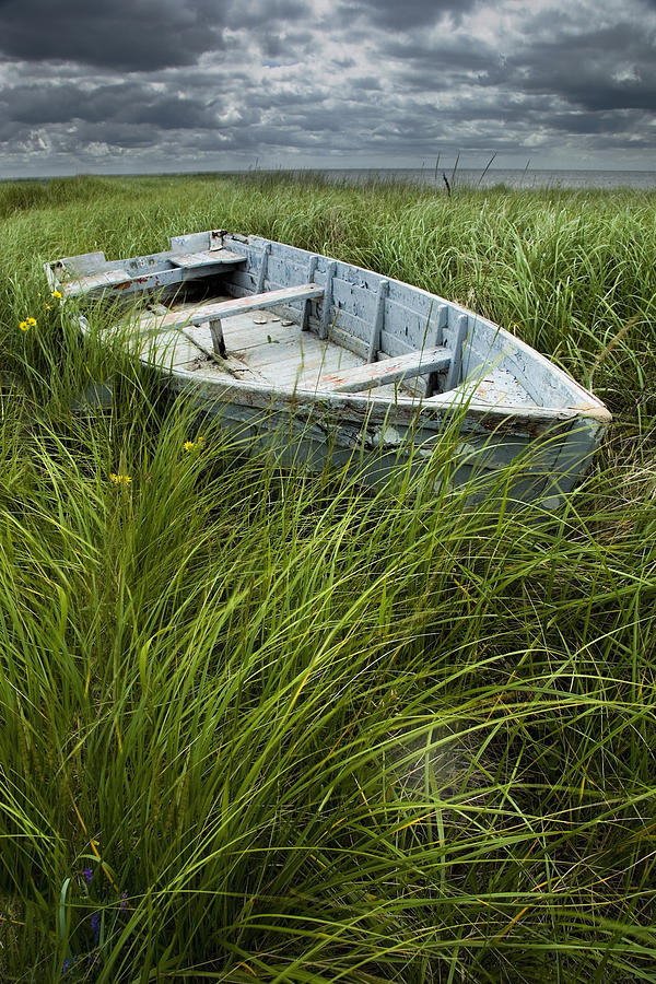 Boat Photograph - Old Weathered Row Boat abandoned in the Grass on PEI by Randall Nyhof