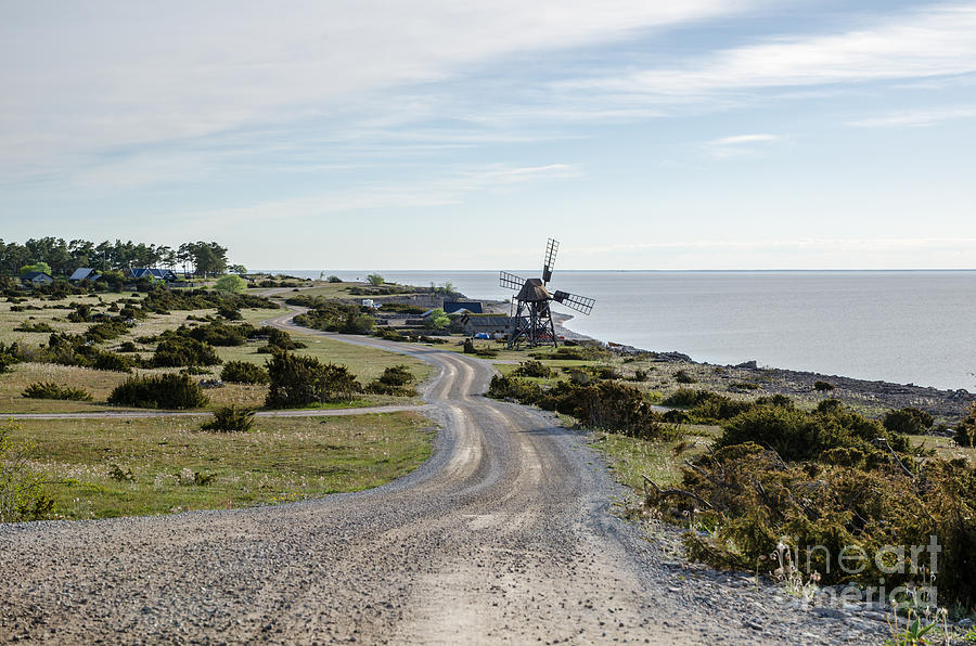 Architecture Photograph - Old windmill by the coast road by Kennerth and Birgitta Kullman