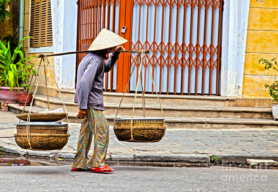 Hat Photograph - Old woman in Hoi An Vietnam by Fototrav Print