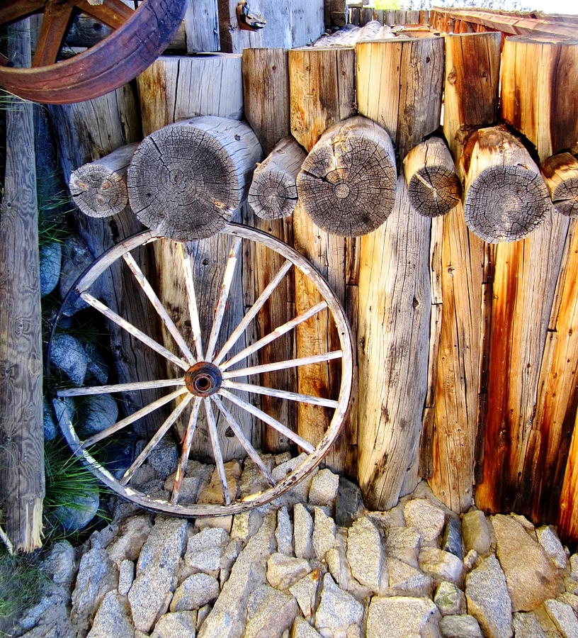 Old Wood And Wagon Wheel Photograph by Marilyn Diaz