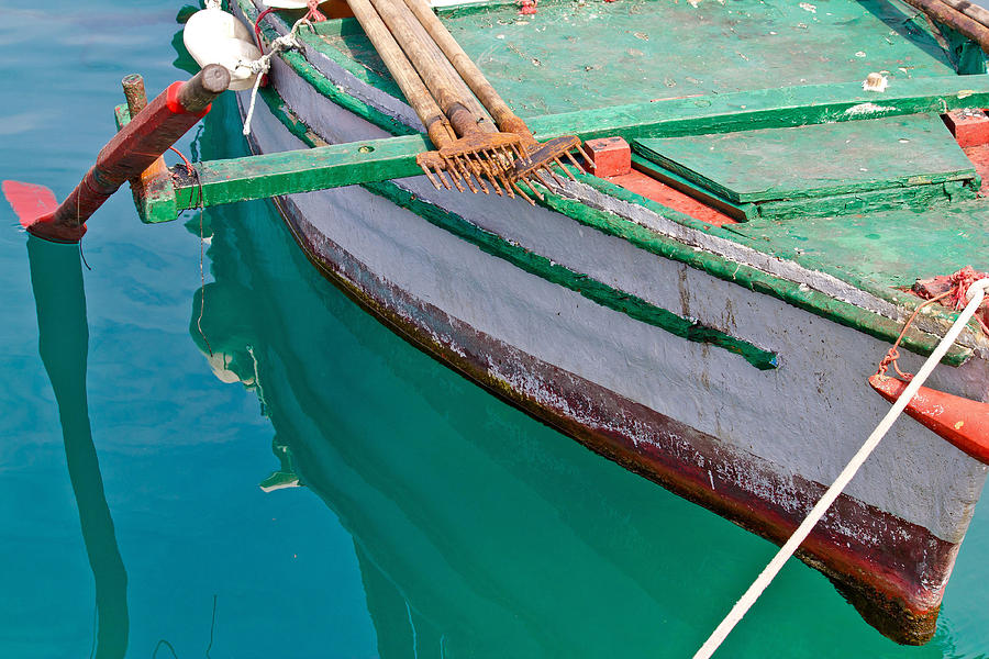 Old wooden fishing boat detail Photograph by Brch Photography