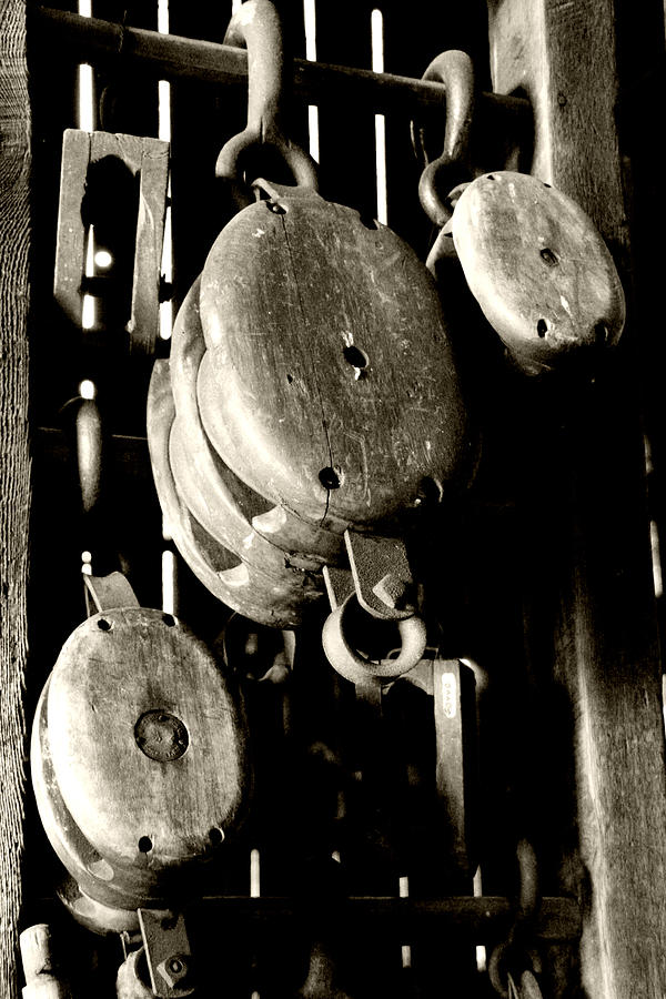 Old Wooden Pulleys Photograph by Heather Allen - Fine Art America