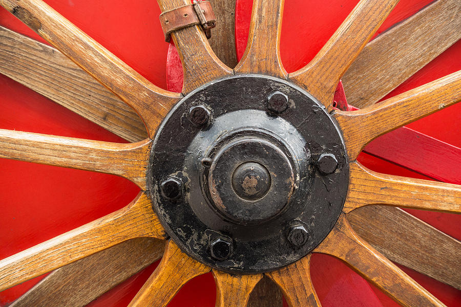 Old wooden spoke wheel Photograph by Matthias Hauser