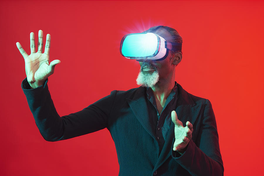 older man with VR headset Photograph by Tara Moore