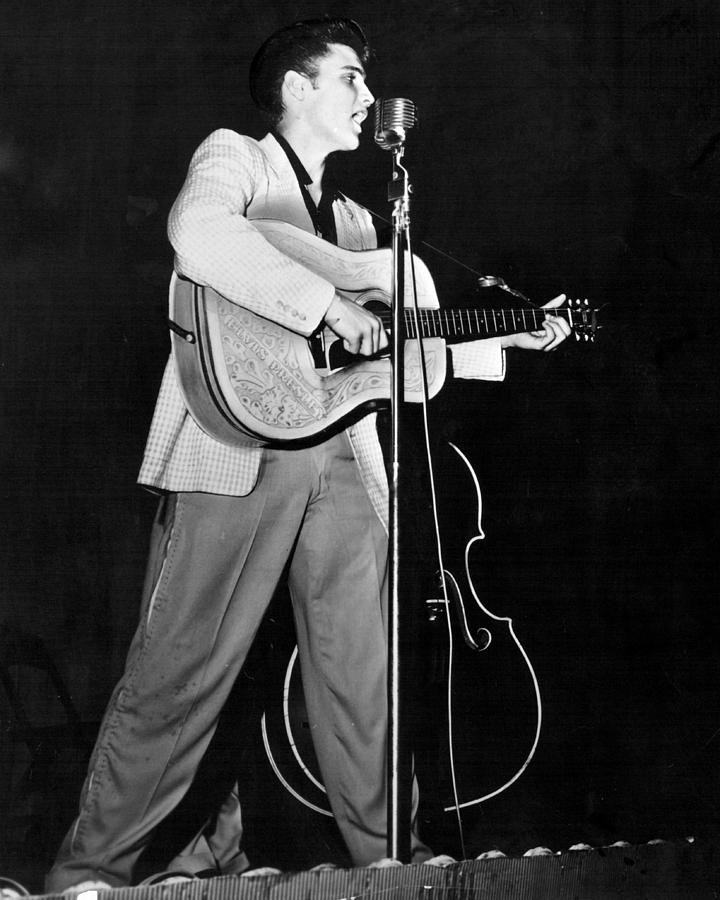 Elvis Presley Photograph - On Stage Elvis Presley Plays And Sings by Retro Images Archive