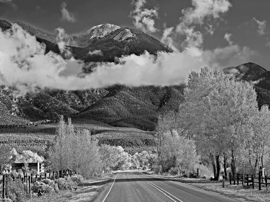 On the road heading north from Taos New Mexico Photograph by Digital Photographic Arts