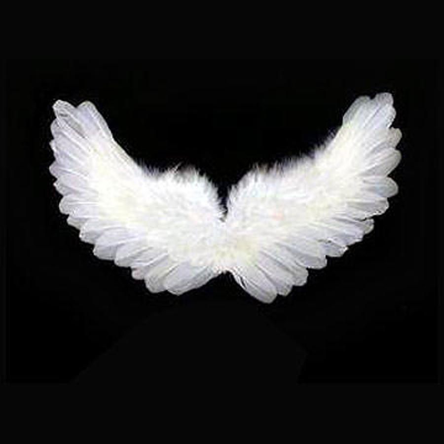 Angel Photograph - On The Wings Of An Angel by Jeff Keay.
