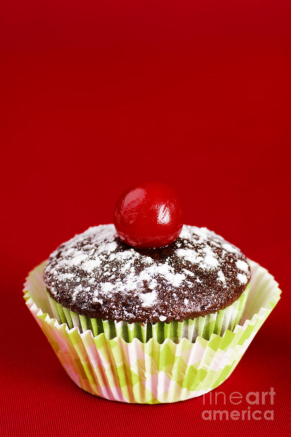 Cake Photograph - One chocolate cupcake with cherry over red by Sylvie Bouchard