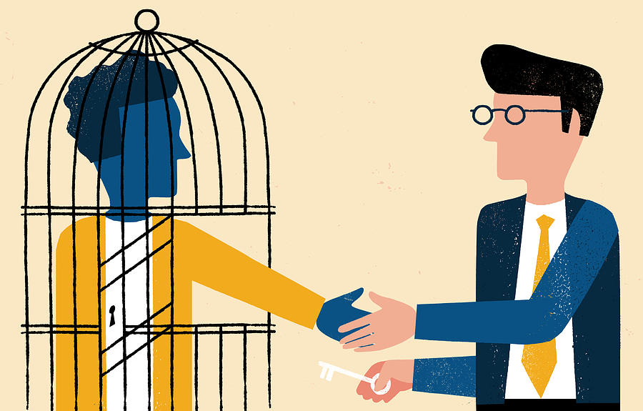 One Man In Cage Shaking Hands With Business Man With Key Photograph by Chris Madden