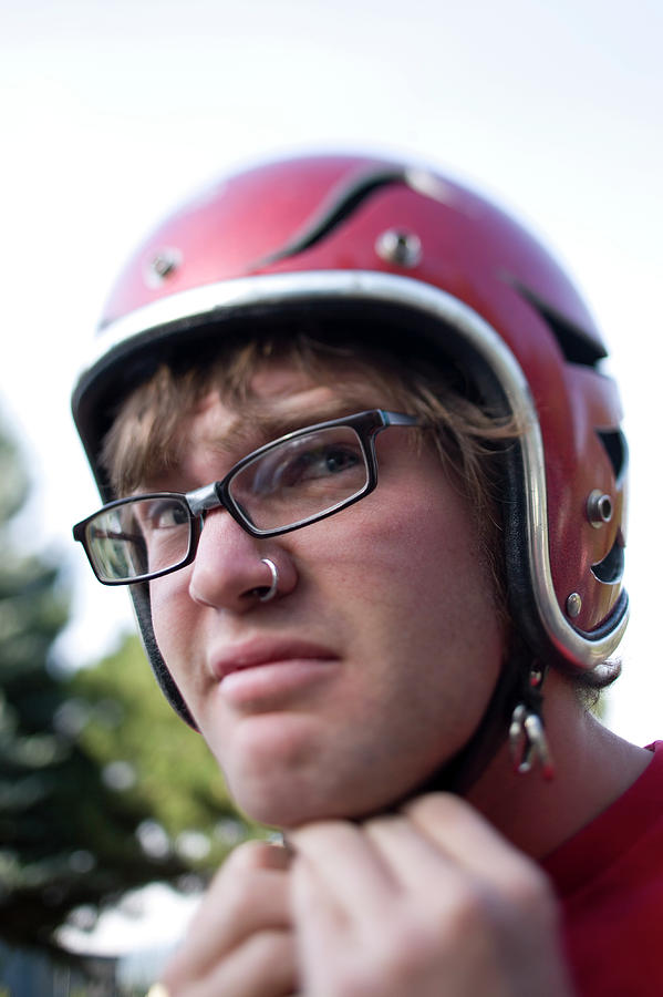 One Nerd Strapping On His Custom Helmet Photograph by Woods Wheatcroft