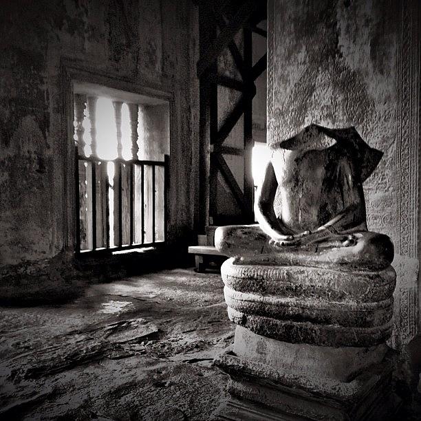 Angkorwat Photograph - One Of The Many Headless Statues Inside by Siva M