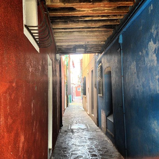 One Of The Small Alleys In Burano Photograph by Roger Ng
