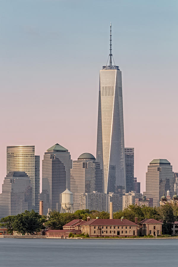 One World Trade Center And Ellis Island Photograph by Susan Candelario