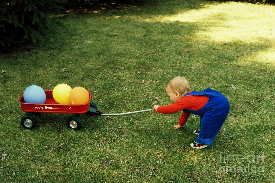 One Year Old Pulls Wagon Photograph by Suzanne Szasz