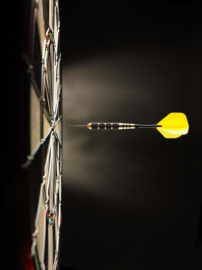 One Yellow Dart on Target Photograph by Wragg