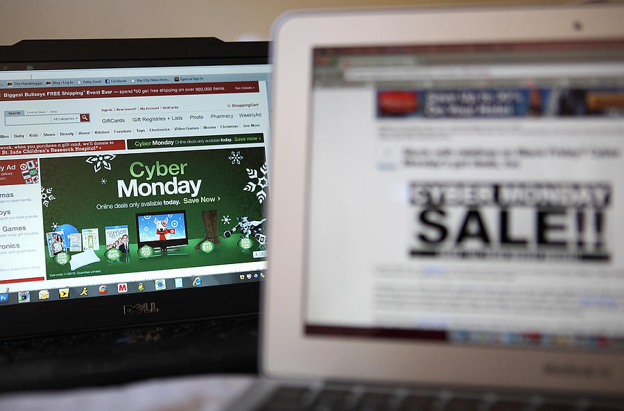Online Shoppers Search For Cyber Monday Deals Photograph by Justin Sullivan