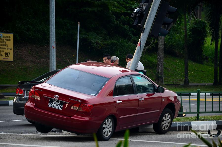 Oops car accident on traffic light at road intersection Photograph by Imran Ahmed