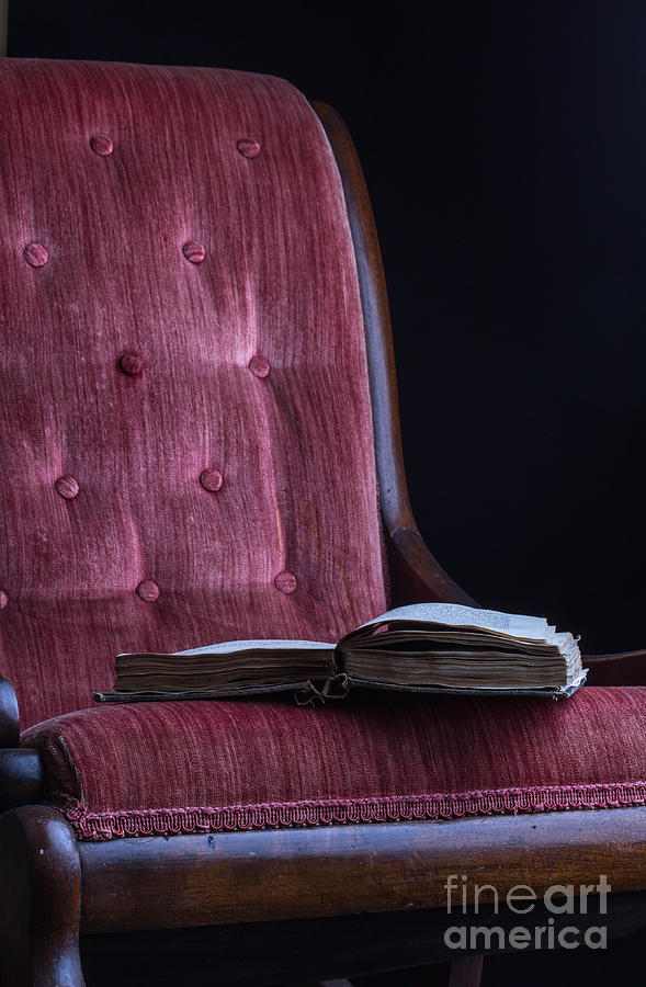 Open book on vintage chair Photograph by Edward Fielding