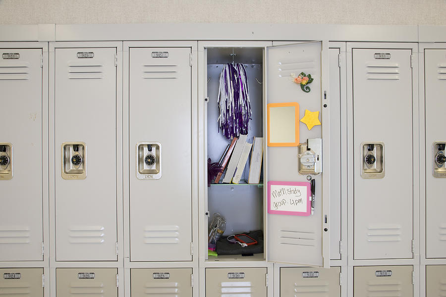 Open locker in high school Photograph by Jetta Productions