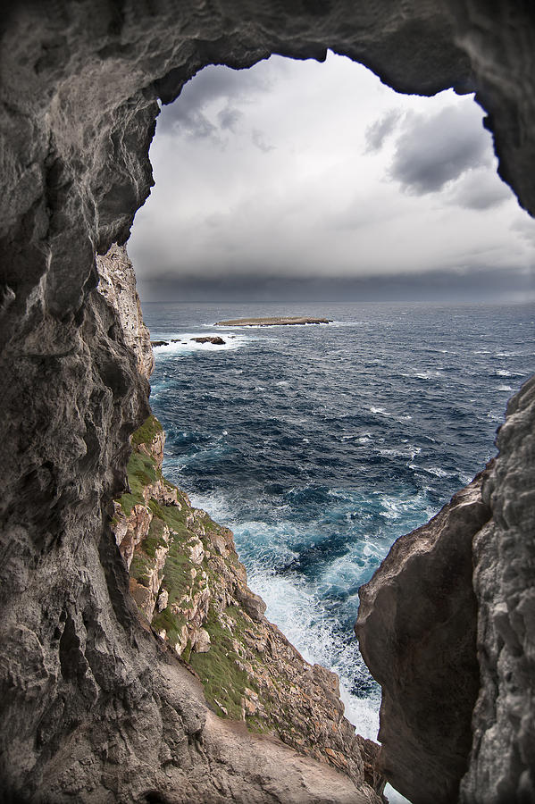 A natural window in Minorca north coast discover us an impressive view of sea and sky - Open window Photograph by Pedro Cardona Llambias