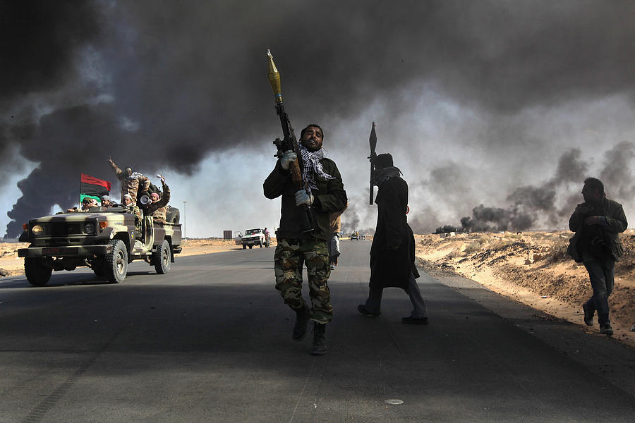 Opposition Rebels Battle Gaddafi Forces In Eastern Libya Photograph by John Moore