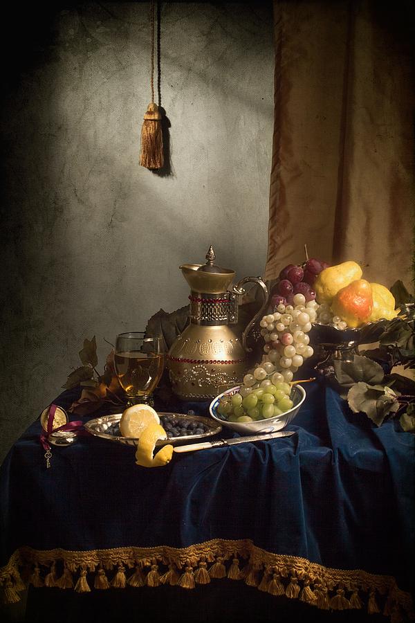 Opulent Still Life with Gilded Jug-silverware and fruits Photograph by Levin Rodriguez