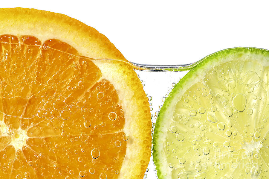 Orange And Lime Slices In Water Photograph