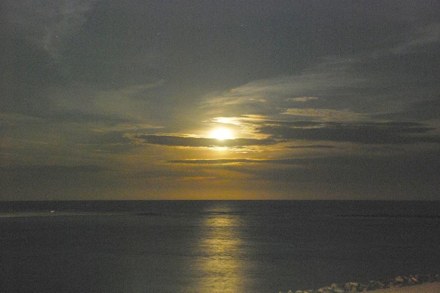 Orange beach moonrise Photograph by Barry Bohn