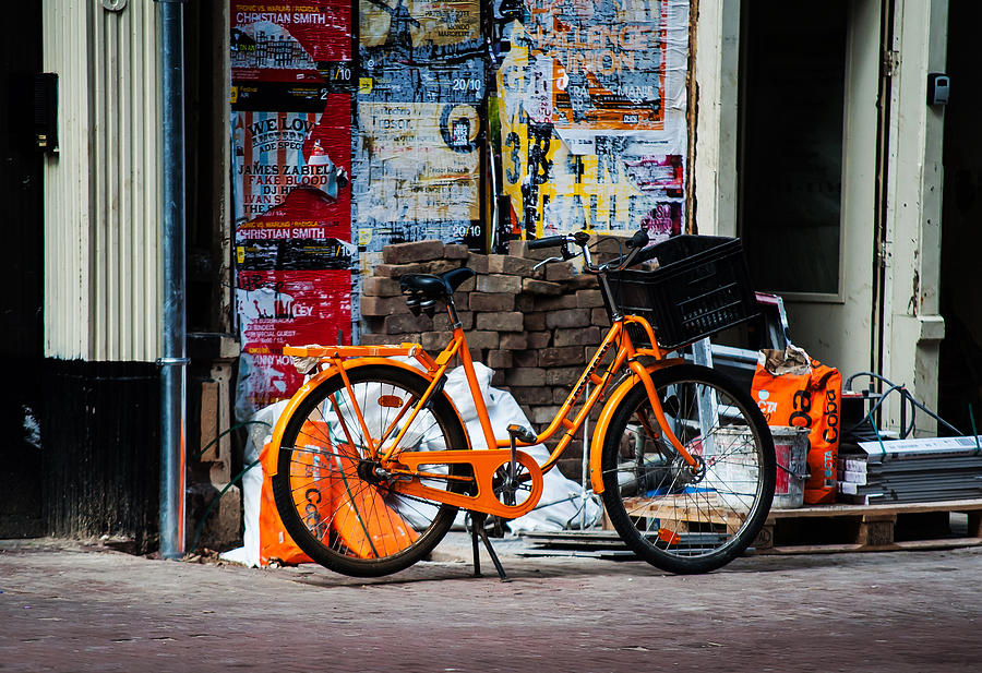 Orange Bike. Amsterdam Photograph by Jenny Rainbow