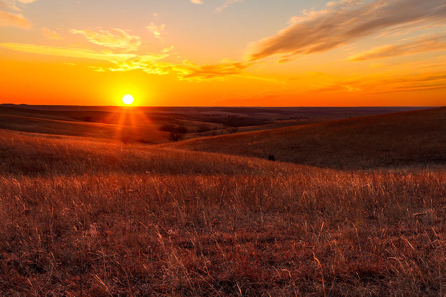 Orange glow of a sunset in Kansas Flint Hills Photograph by Tommy ...