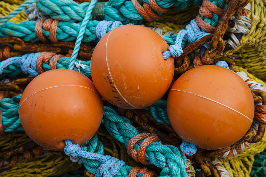 Orange Net Floats Photograph by Carol Leigh