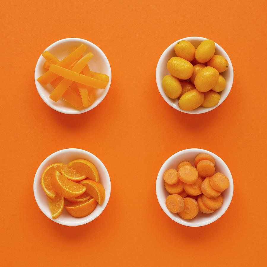 Orange Produce In Dishes Photograph by Science Photo Library
