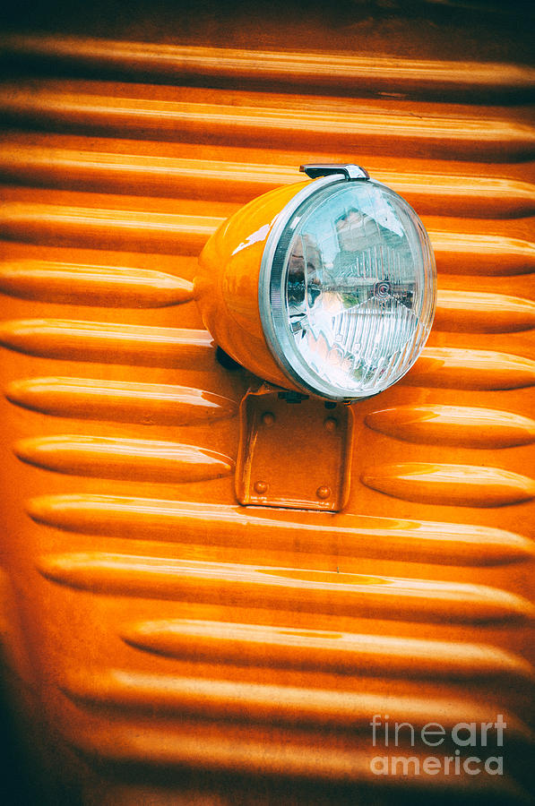Orange van headlight Photograph by Silvia Ganora