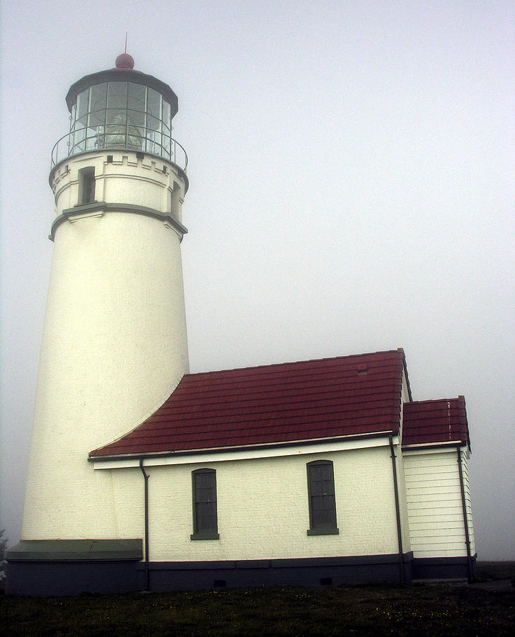 Oregon Lighthouse In Fog Photograph by Robert Lozen