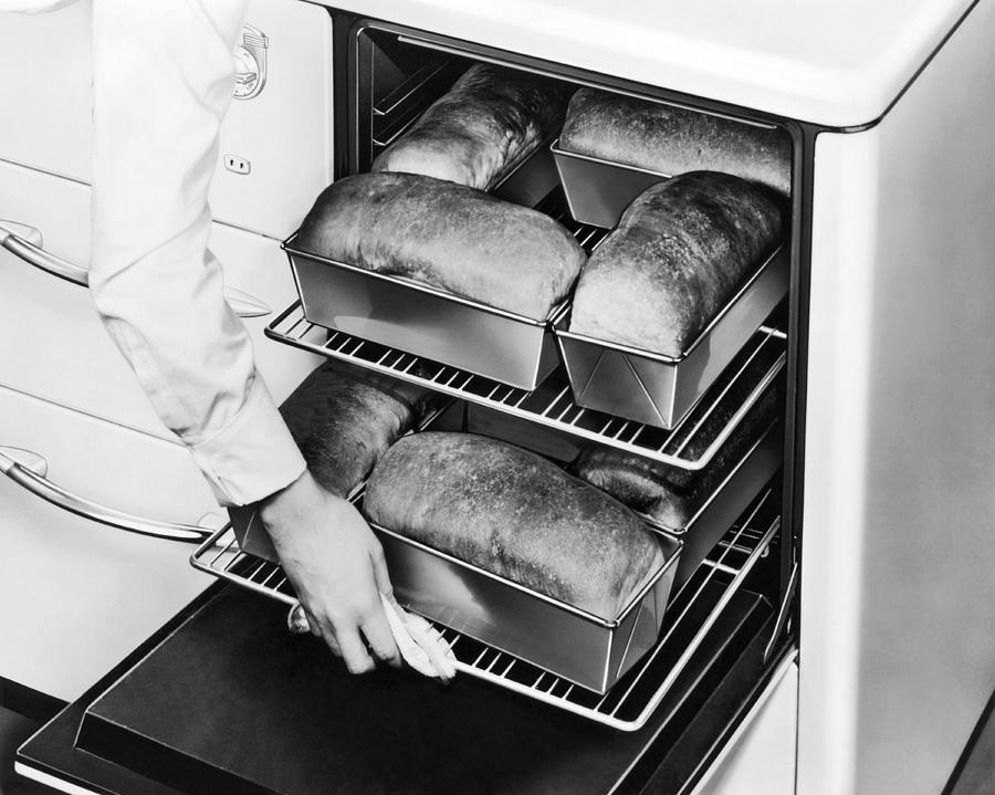 Black And White Photograph - Oven Fresh Warm Bread by Underwood Archives