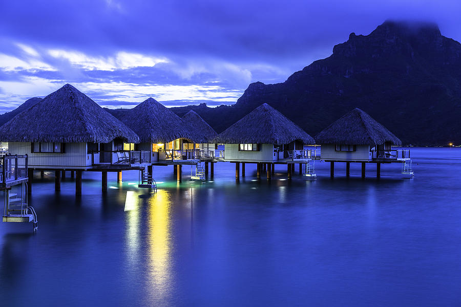 Overwater Bungalows After Sunset Photograph by Mel Ashar