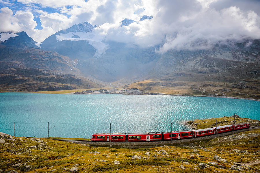 Overlooking view of train running on the Bernina railway in Switzerland. Photograph by Max shen